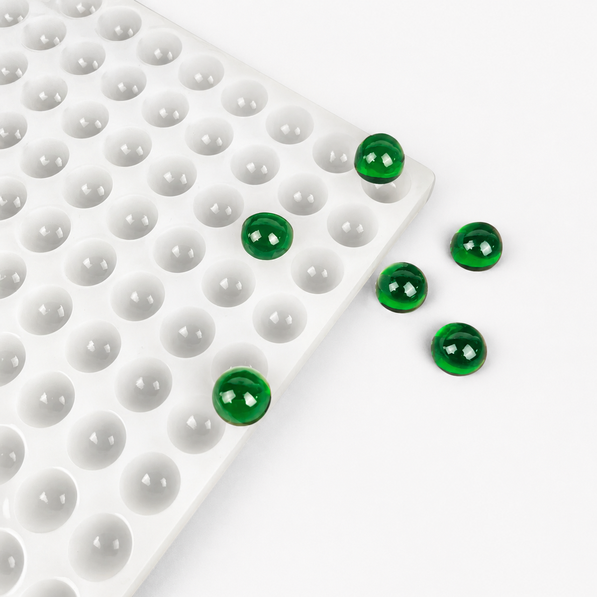 1.5mL gummy bear silicone mold with 296 cavities and emerald-green gummy samples