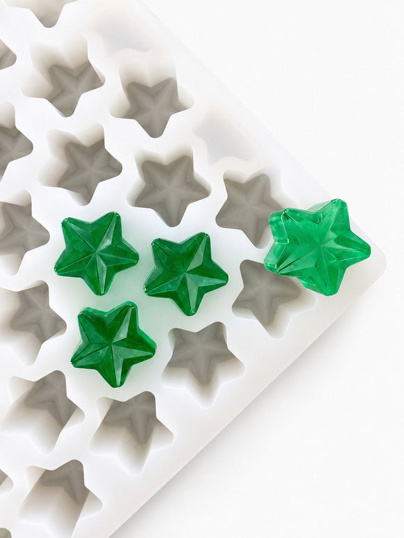 4mL star gummy mold with 168 cavities and emerald green star gummies on a white background
